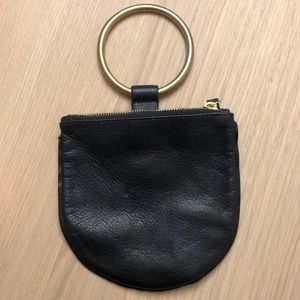 Black leather clutch with gold hardware